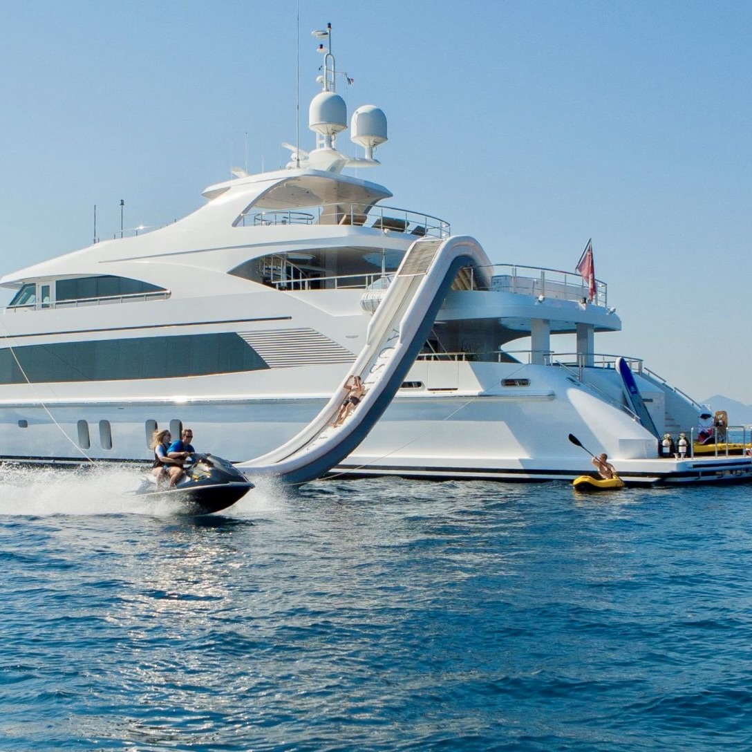 Luxury motor yacht with water slide and jet ski